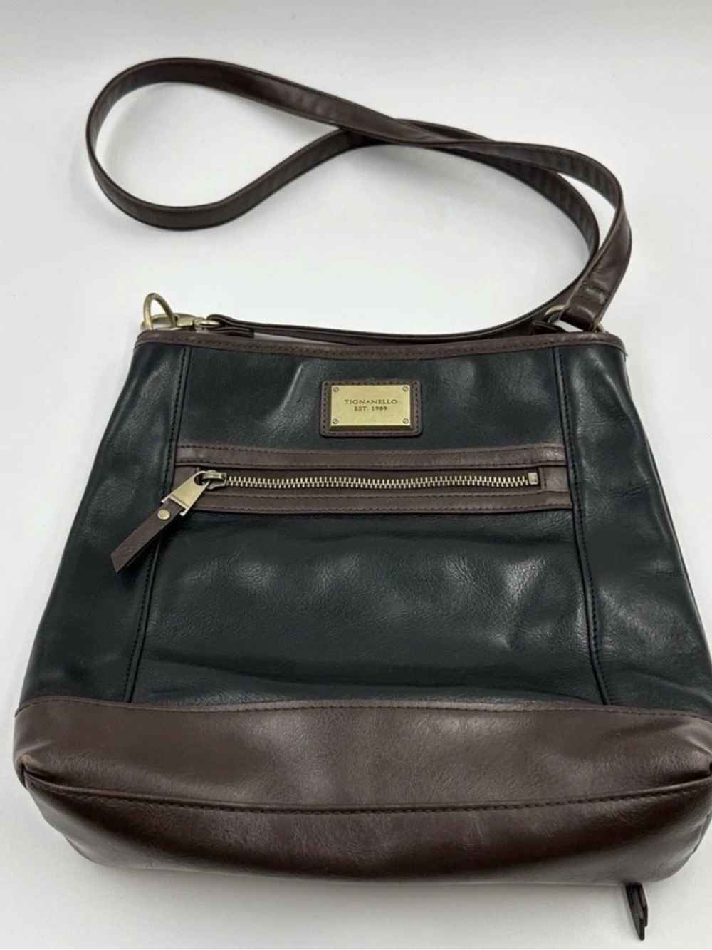 Tignanello Black and Brown Leather Wristlet with Chain-Print Lining